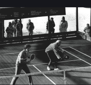 During one of the Tribuno Tour events, Hank Irvine hits a service volley while Herb Fitz Gibbon closes in on the center. This team dominated several of the Tribuno tournaments and won the Nationals in both 1977 and 1978