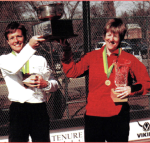 Sue Aery and Gerri Viant accept the trophy for the 2002 Women's Open National Champions.